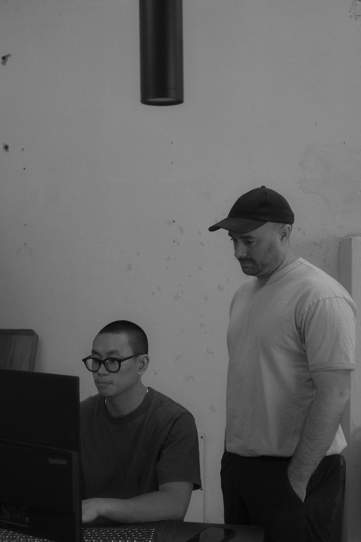 The Paradox Movement team reviewing a design in the studio